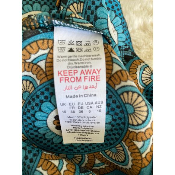 Nasty Gal Collection Retro Hippie 70s Print Wide Leg Flare‎ Pants Sz 6 - Picture 10 of 12